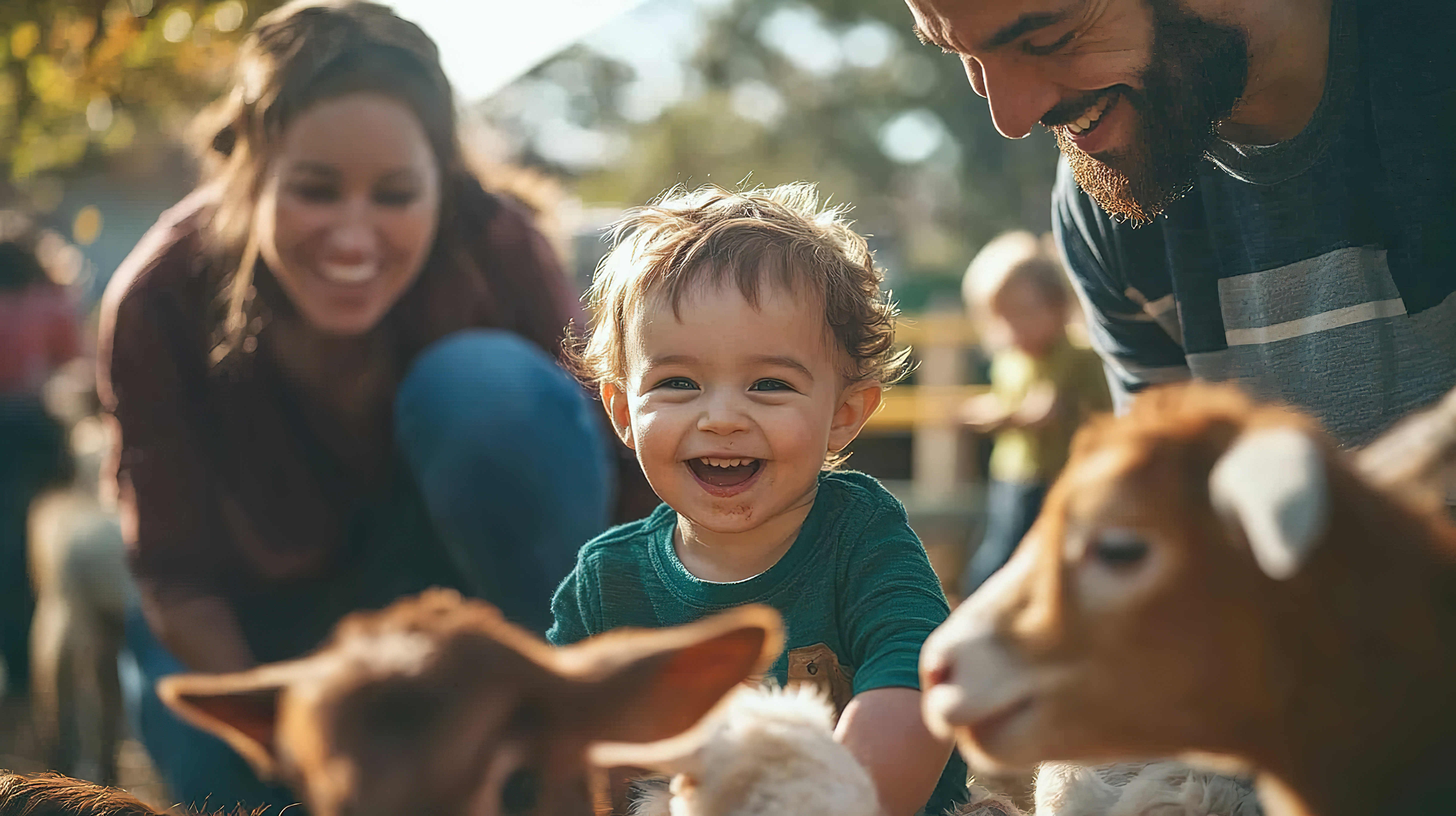 A family meeting the goats at the Hyphae House farm